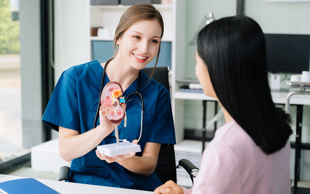Portrait of female doctor explaining diagnosis to her patient. Doctor Meeting With Patient In Exam Room. A medical practitioner reassuring a patient in hospital